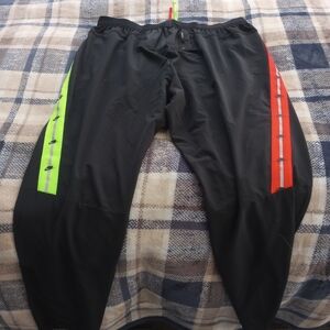 Nike Black Joggers with Neon Green and Red Stripes